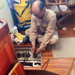 Humberto checks the fuel tanks for turbidity and determines only the port tank needs cleaning.