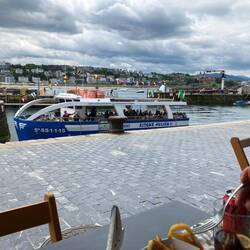 Tourist boats going in and out of the harbour.