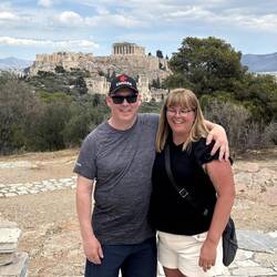 Mike and Jodi with view of the Acropolis from Nymphs Hill West of the Acropolis