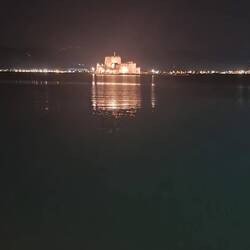 The fortress by night.
