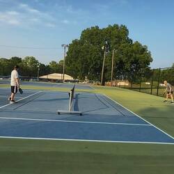 Way to put some top spin on that ball Don ... hope it makes it over the net!