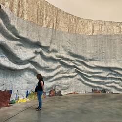 El Anatsui: made of stapled bottle caps and labels in chicken wire:Rising Sea, Nsukka Nigeria