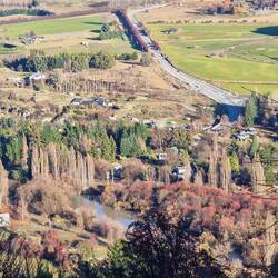 View over a valley in Queenstown seen on coach trip