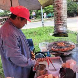 Bbq sausages, served with raw cabbage and very spicey green chilli, a great lunch for 20 baht.