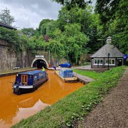 North portal, the tunnel keeper's hut and the old tunnel entrance beyond