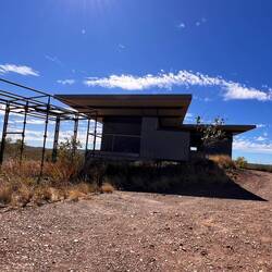 An abandoned, damaged house on the hill