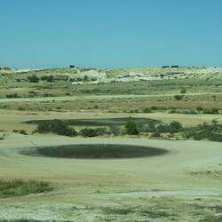 The 'green' is sprayed with sump oil