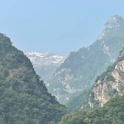 There's still snow on the tops of the mountains