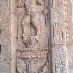 Decorations on the side of the portal. Its made of sandstone so slowly wearing away