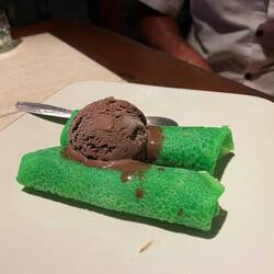 Interesting coconut filled green crepes
