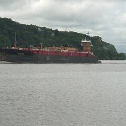 Is it a ship? No. An empty fuel barge returns downriver to NYC pushed by a tug
