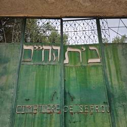 In Hebrew, it says House of the Living, which is either to ward off evil or for remembering the dead