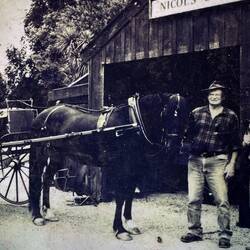 Steve, who let us stay in the camp hut, pictured outside the old blacksmiths, with his horse