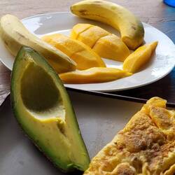 Guesthouse breakfast, Omelette- fresh mango,banana & avocado - Pai.