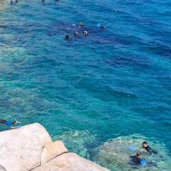 People snorkeling below my balcony