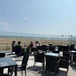 The restaurant had a glass barrier so cool breezes must be the norm