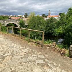 Coming into the cute town before Melide over a medieval bridge