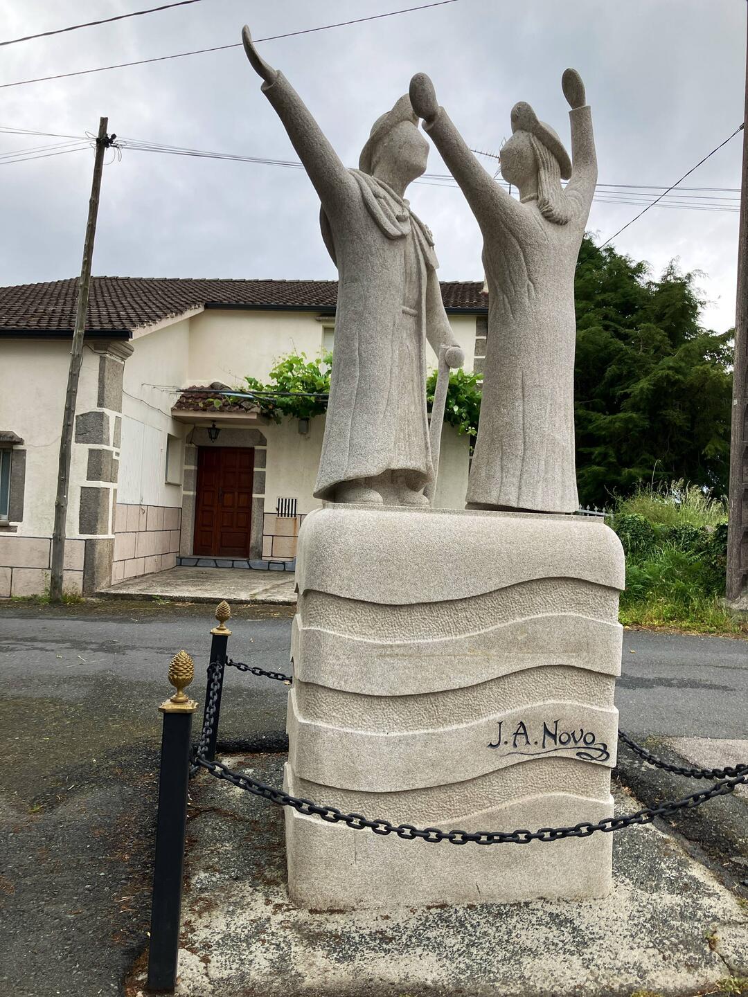 Academe off by the pilgrim statue as Zinleave Palais de Rei