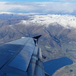 View over the Queenstown south island alps from the plane