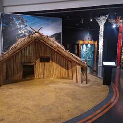 A traditional Maori house not sure if it's a style still used