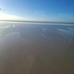 So flat - the wind has blown water over the sand plain