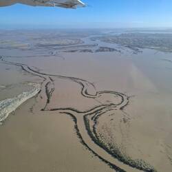 Rivers overflowing and filling the lake Eyre area