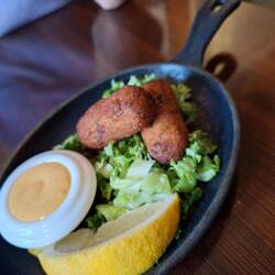 Vorspeise mit Klippfisch, Kartoffel und Käse