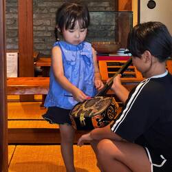 Playing the Shamisen