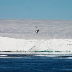 The last chopper ... ferrying the expedition team back to Ortelius from Berkner Island — Gould Bay.