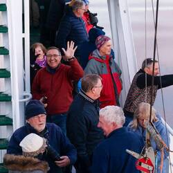 Mui amid everyone out on deck vying for photos and videos of liquid gold — Antarctica.