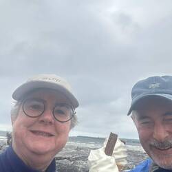 Beach walkers enjoy a 99