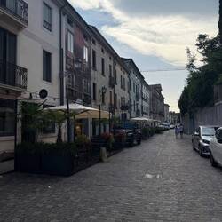 A bunch of cute bars across the river