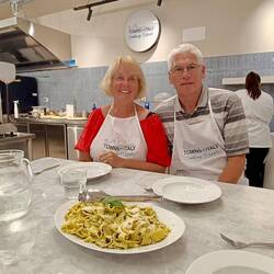 One of us looks more excited than the other to be doing this cooking class