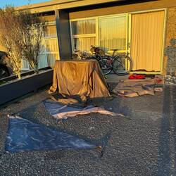Camping kit chaos at the motel. Drying out in the evening sun.