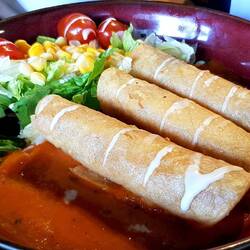 "Flautas", a local specialty, well seasoned and filled with chicken or beef.