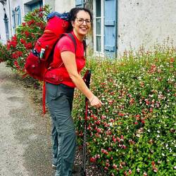 Sinéad taking time to small the Flowers
