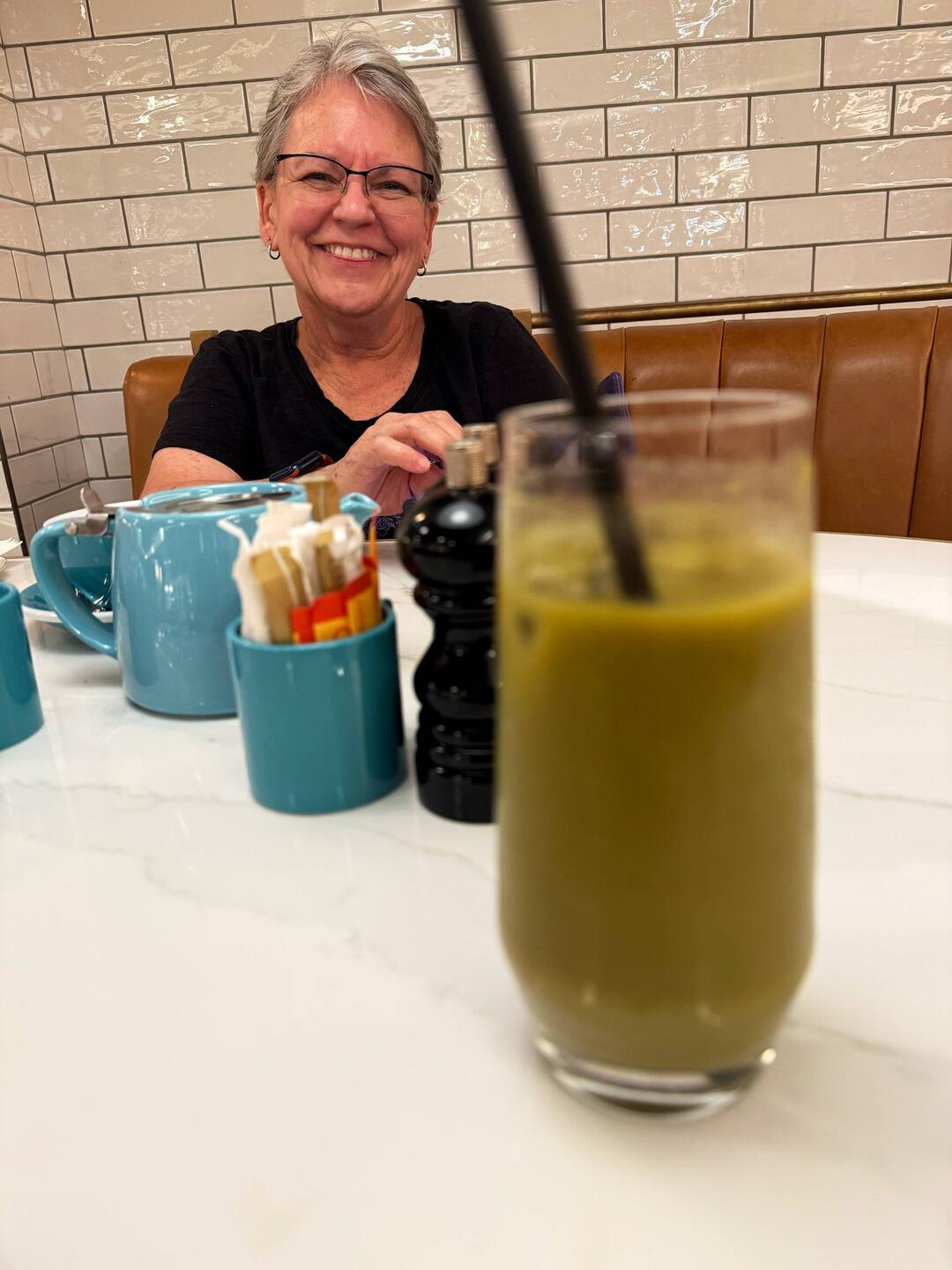My smoothie and Janet waiting patiently for her clotted cream and jam scones.