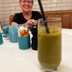 My smoothie and Janet waiting patiently for her clotted cream and jam scones.