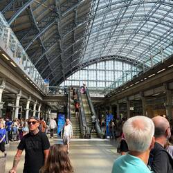 At the train station waiting to get in line for the 11:31 train
