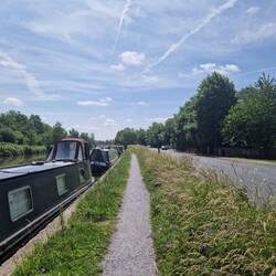 Boats, towpath, verge, road. But needs must.