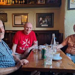Three men in a pub
