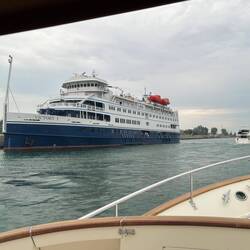 A Great Lakes cruise liner waits to enter the canal from Lake Erie as we pass out at Port Colborne