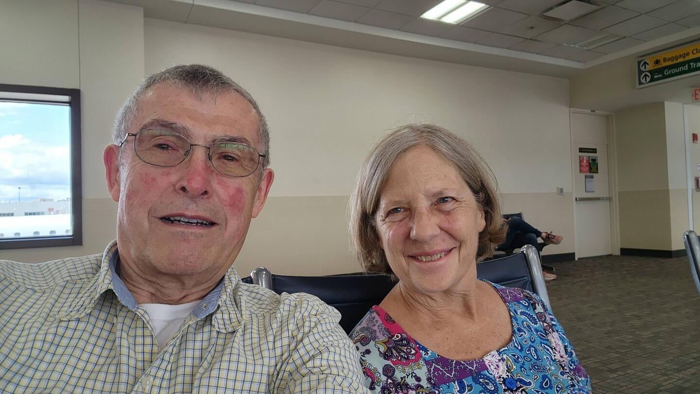 Our happy faces at the airport on 6/19.