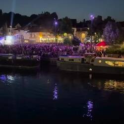 As the ship pulls out of port