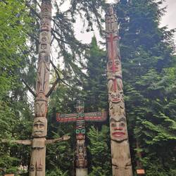 Totems at the Capulino suspension bridge gardens