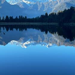 Lake Matheson. "Look deep into nature and then you will understand everything better" Einstein