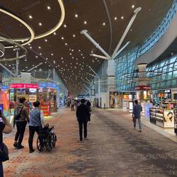 Walking to our gate at the Main Terminal in KUL.