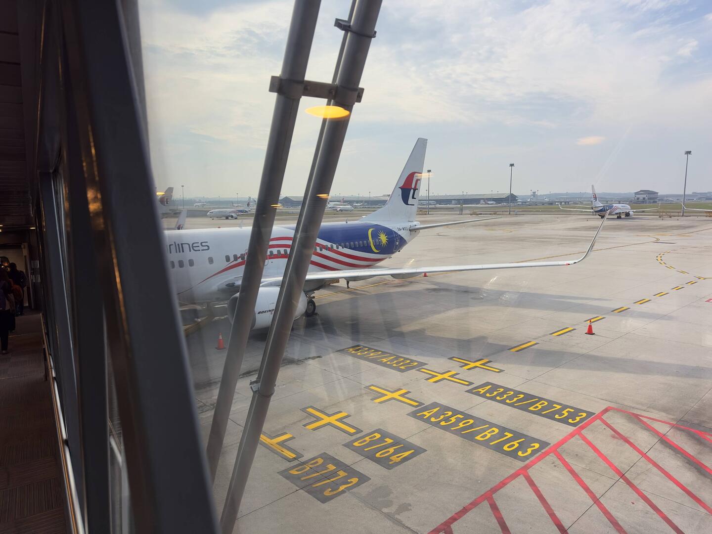 9M-MXU at the gate operating as MH772.