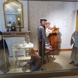 Modell einer Familie in Ypern zu der Zeit