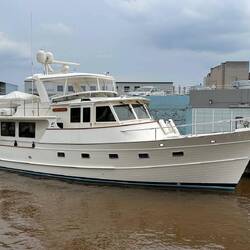 Company traffic! We pass a Fleming 55 moored on the Black River